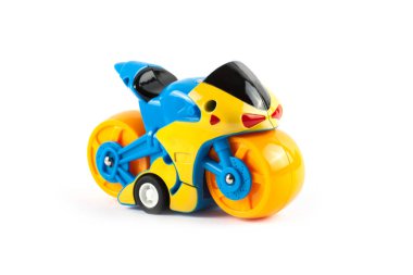 Oyuncak motosiklet üzerinde beyaz izole. Nesneleri kapatmak.