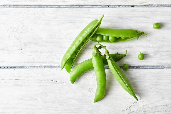 Taze yeşil bezelye kapatın. Gıda katkı maddeleri. Doğa arka plan