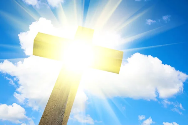 Wood Cross on blue sky. Religion background