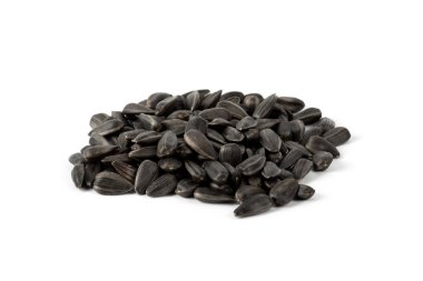 Beyaz arka plan üzerinde izole kabuğu ile ayçiçeği tohumu. Gıda katkı maddeleri