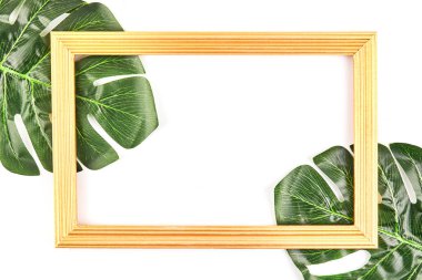 Tropikal yaprak vintage çerçeve ile yapılmış yaratıcı düzeni.