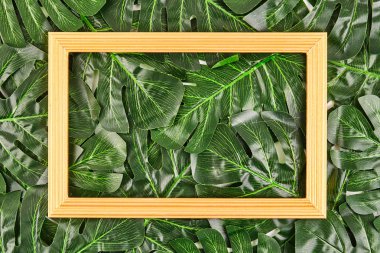 Tropikal yaprak vintage çerçeve ile yapılmış yaratıcı düzeni.