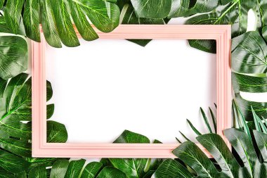 Tropikal yaprak vintage çerçeve ile yapılmış yaratıcı düzeni.