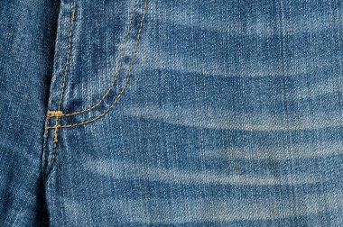 Blue Denim kotları ayrıntıları kapatır. Dokular ve arka planlar. Moda ve modaya uygun kıyafetler.