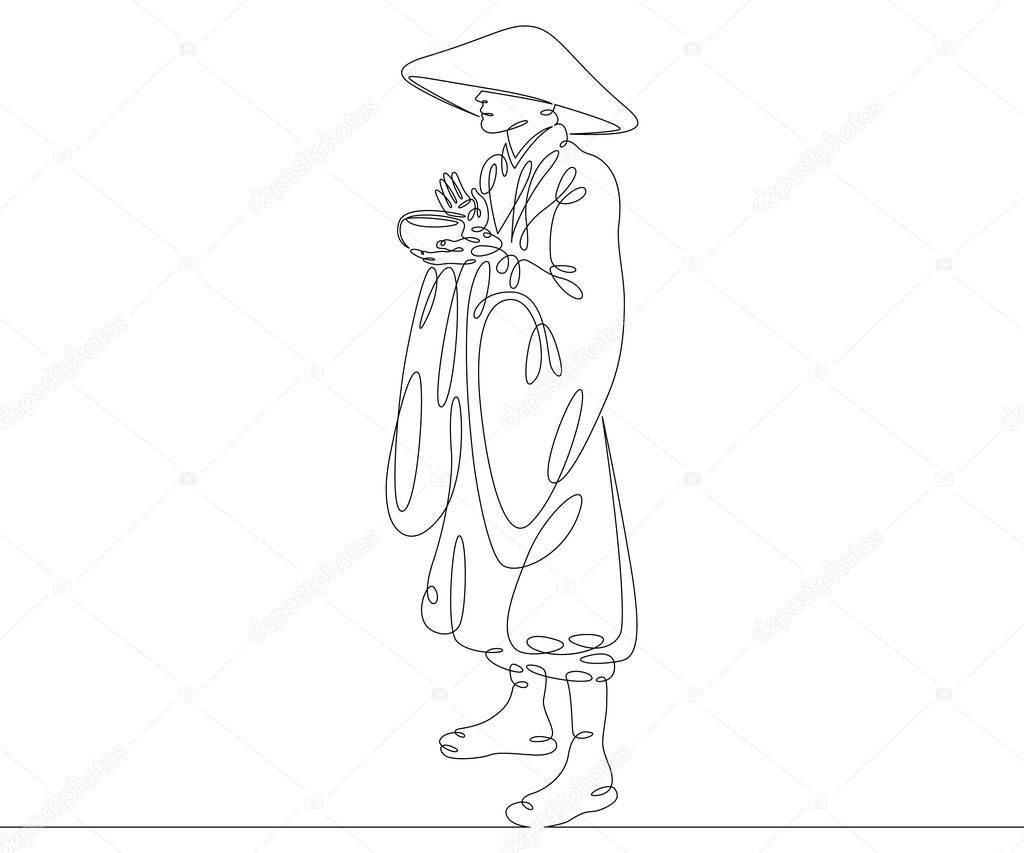 buddhist monk in hat