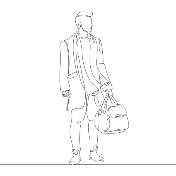 Porträt eines gutaussehenden Mannes im Mantel mit einer Tasche in der Hand — Stockfoto