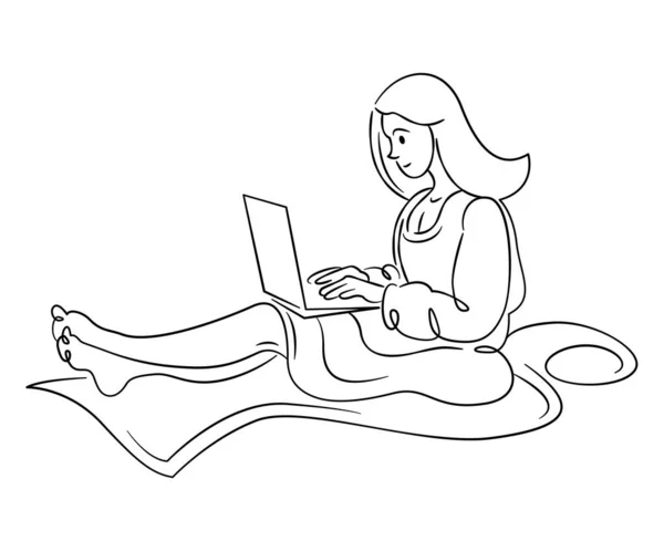 Chica joven con el pelo largo trabaja en un ordenador portátil. —  Fotos de Stock