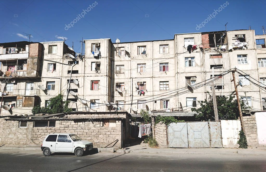Dilapidated houses with the poor population, migrants. Without repair