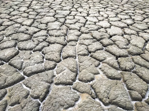 Het Oppervlak Rond Vulkaan Gebarsten Bevroren Modder Achtergrondafbeelding — Stockfoto