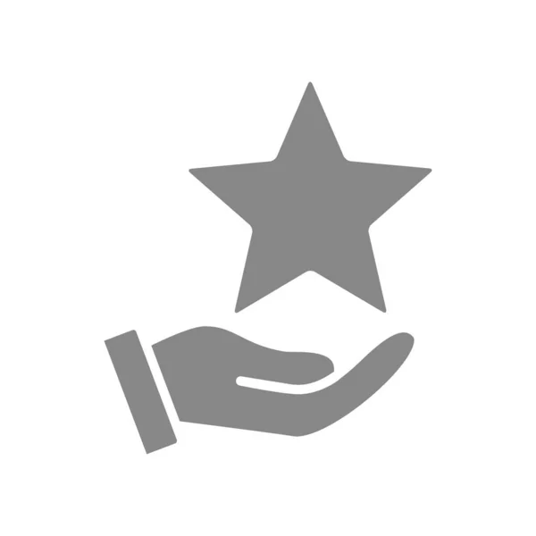 Ręka trzyma gwiazdę na palmowo-szarej ikonie. Charytatywność, dodaj do ulubionych, recenzja klientów, symbol oceny — Wektor stockowy