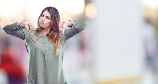 Young Beautiful Girl Dissenting Serious Stern Expression Thumbs Disapproval — Stock Photo, Image