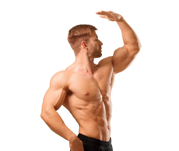 Unga Stiliga Bodybuilder Man Poserar Med Muskulös Utseende — Stockfoto