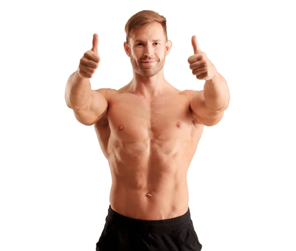 Junger Hübscher Bodybuilder Posiert Mit Muskulösem Aussehen — Stockfoto