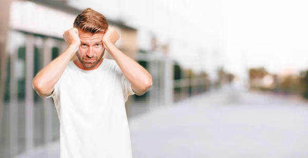 Young Blonde Man Looking Stressed Frustrated Looking Upwards Holding Both — Stock Photo, Image