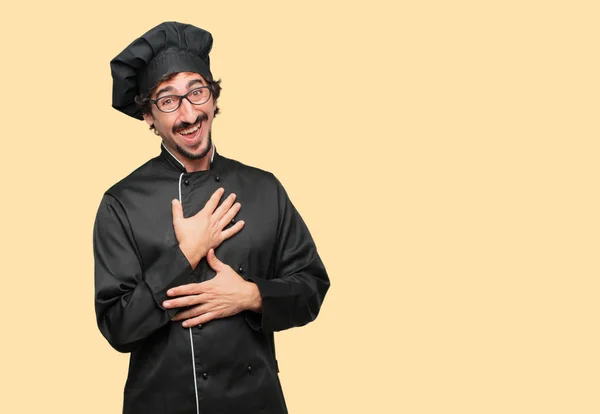 Joven Loco Como Chef Riendo Voz Alta Con Cabeza Inclinada —  Fotos de Stock