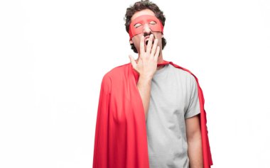 Genç süper kahraman isteksiz ve bıkkın, seyir bir şey sıkıcı ve sıkıcı, halis can sıkıntısı esneme için dinleme sakallı.