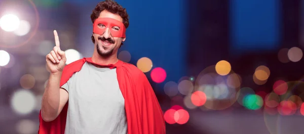 Joven Barbudo Súper Héroe Sonriendo Mirando Satisfecho Feliz Contando Número —  Fotos de Stock