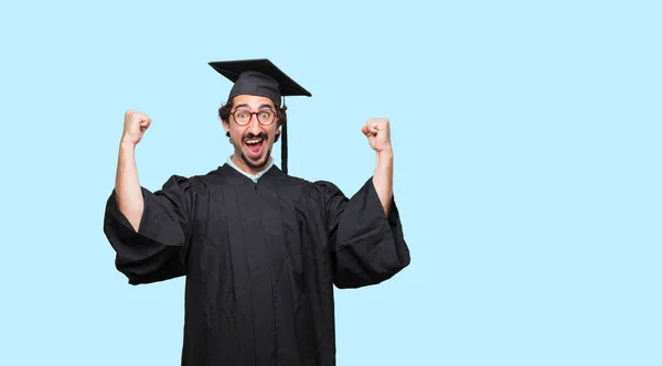 Young Graduated Man Forcing Smile Face Both Index Fingers Sending — Stock Photo, Image