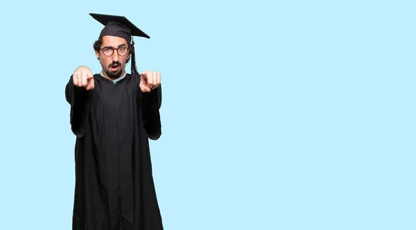 Young Graduated Man Smiling Happily Pointing Forward Both Hands Choosing — Stock Photo, Image