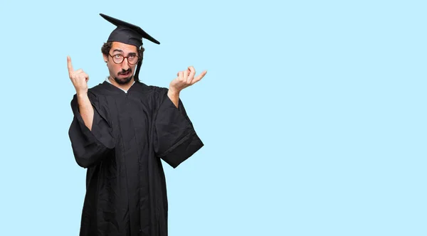 Young Graduated Man Shouting Crazy Amazed Look Surprise Both Hands — Stock Photo, Image