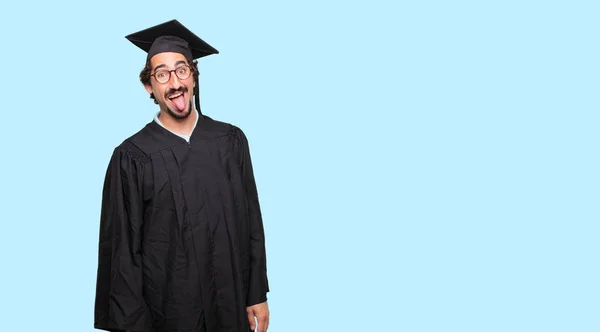 Jovem Graduado Homem Brincando Furando Língua Para Fora Com Uma — Fotografia de Stock