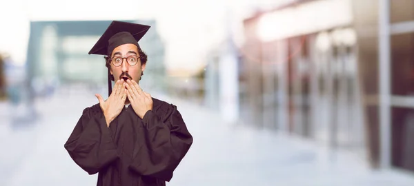 Young Graduated Man Covering Mouth Hand Gesture Surprise Order Remain — Stock Photo, Image