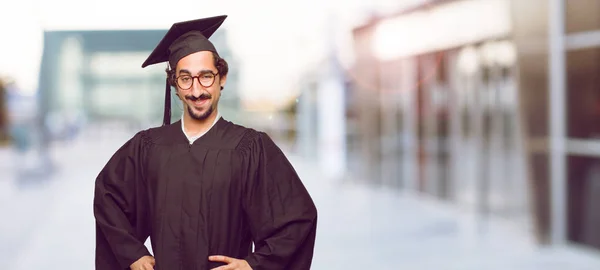 Young Graduated Man Smiling Proudly Confidently Arms Hands Hips Akimbo — Stock Photo, Image