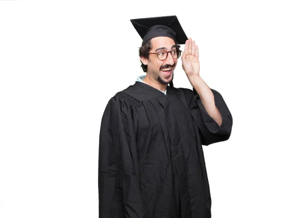 graduate bearded man paying attention, trying to hear and listen to what is being said, lending an ear.