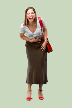 young pretty woman Laughing out loud with head tilted backwards and happy, cheerful expression clipart
