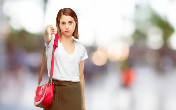 Young Pretty Woman Dissenting Serious Stern Expression Thumbs Disapproval — Stock Photo, Image