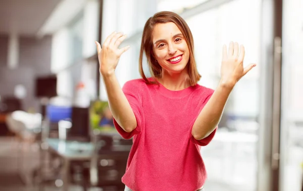 young woman full body. smiling with a proud, satisfied and happy look, welcoming gesture, greeting you.