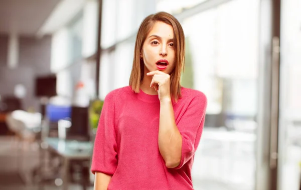 young woman full body. with a goofy, dumb, silly look, feeling shocked and confused at a recent realization, not really understanding an idea.