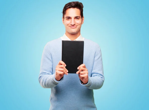 Joven Guapo Bronceado Hombre Con Libro —  Fotos de Stock