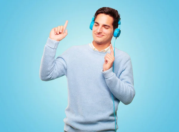 Young Handsome Tanned Man Listening Music Headphones — Stock Photo, Image