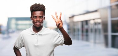 Genç serin siyah adam işareti. tek renkli bir arka plana dayanır kişi kesip