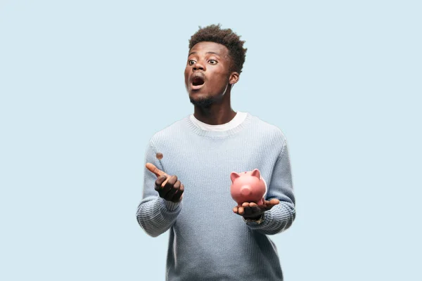 Jovem Negro Homem Com Porquinho Banco — Fotografia de Stock