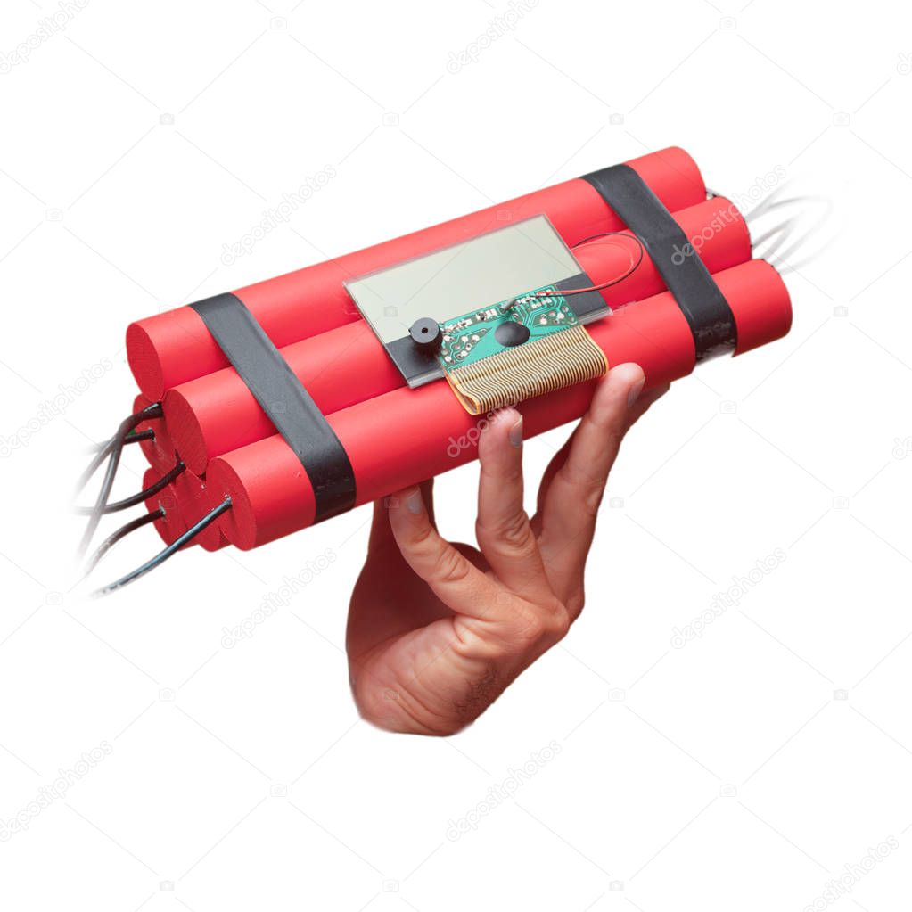 isolated male hand with a dynamite bomb