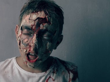 Ölü çocuk zombi. Korku Cadılar Bayramı kavramı.