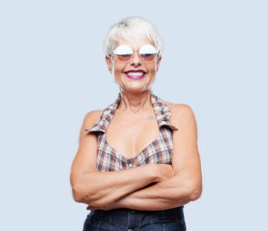 senior cool woman with a satisfied and happy look on her face, smiling sincerely an affectionate smile. clipart