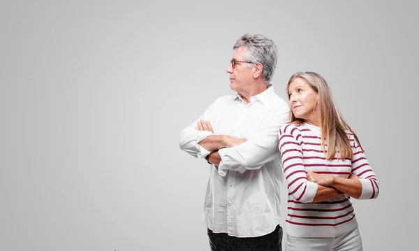 Senior Cool Husband Wife Dissenting Serious Stern Expression Crossed Arms — Stock Photo, Image