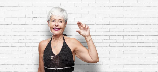 Senior Cool Woman Smiling Satisfied Expression Showing Small Object Concept — Stock Photo, Image