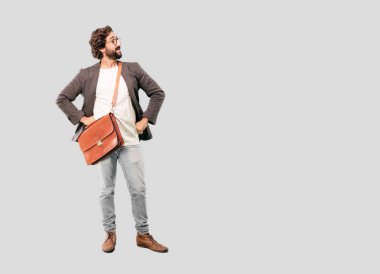 genç işadamı ceket giyen sakallı. Gurur veya başarı ifade.