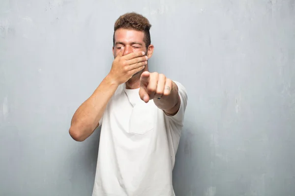 Young Handsome Man Laughing Hard Something Hilarious Pointing Sideways While — Stock Photo, Image