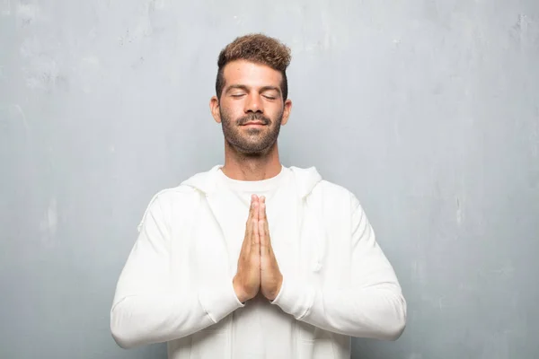 Young Handsome Man Praying Saintly Manner Begging Please Wish Happen — Stock Photo, Image