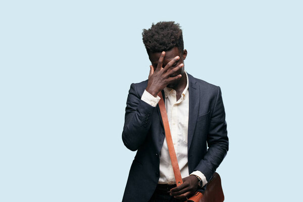 young black businessman posing