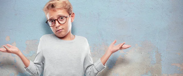 Young Blonde Handsome Boy Quizzical Confused Look Doubting Different Choices — Stock Photo, Image