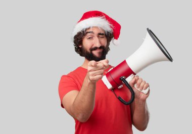 Megafon ile genç deli adam. Noel kavramı.