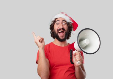 Megafon ile genç deli adam. Noel kavramı.