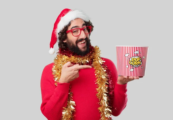 Young Crazy Man Eating Popcorn Christmas Concept — Stock Photo, Image