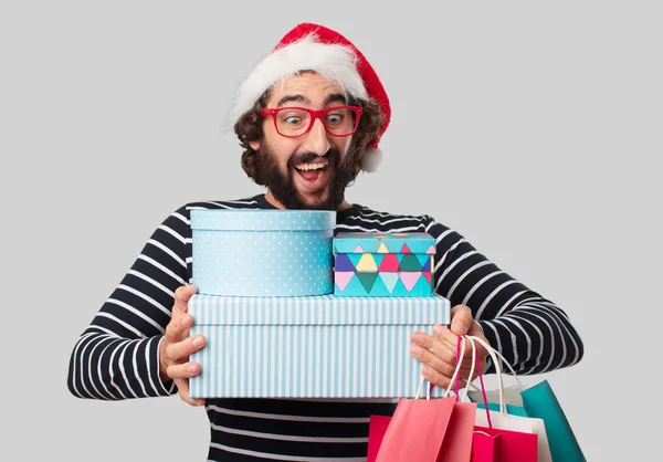 Junger Verrückter Mit Weihnachtsgeschenken Und Einkaufstaschen — Stockfoto